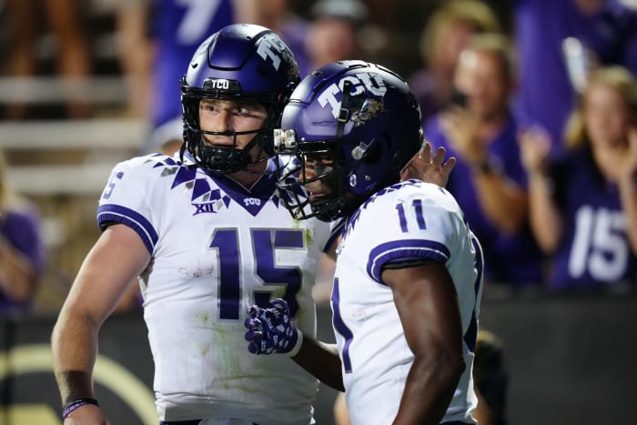 Sep 2, 2022; Boulder, Colorado, USA; TCU Horned Frogs wide receiver Derius Davis (11) celebrates his touchdown with quarterback Max Duggan (15) in the fourth quarter against the Colorado Buffaloes at Folsom Field. Mandatory Credit: Ron Chenoy-USA TODAY Sports